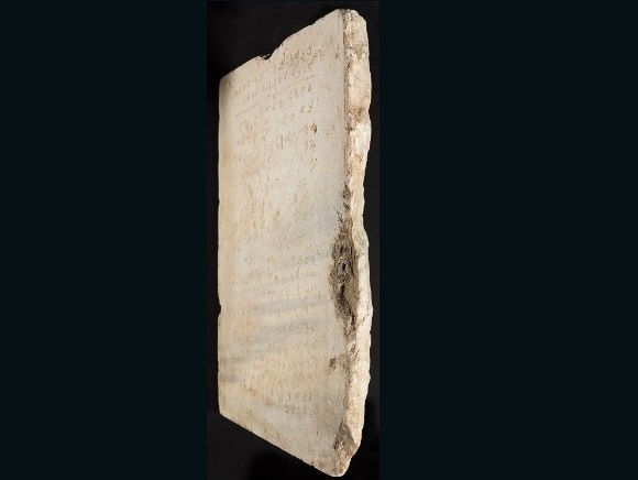 Slab of Ten Commandments side slanted view.