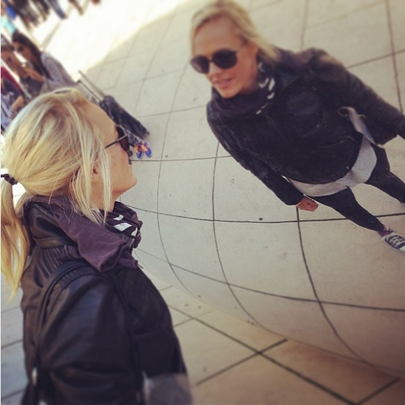 Jenny Grumbles sees reflection in mirrored sculpture.