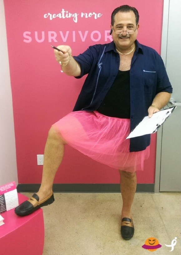 John Luke wearing a pink tutu.