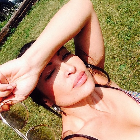 Ursula Stolf stands outside in the sun.