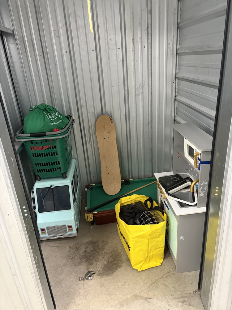3307-StorageMart 52nd and Peigan Trail  auction IB-1128 10