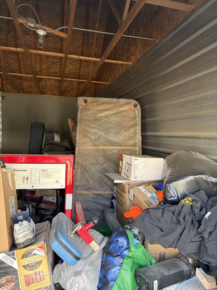 3307-StorageMart 52nd and Peigan Trail  auction IB-7705